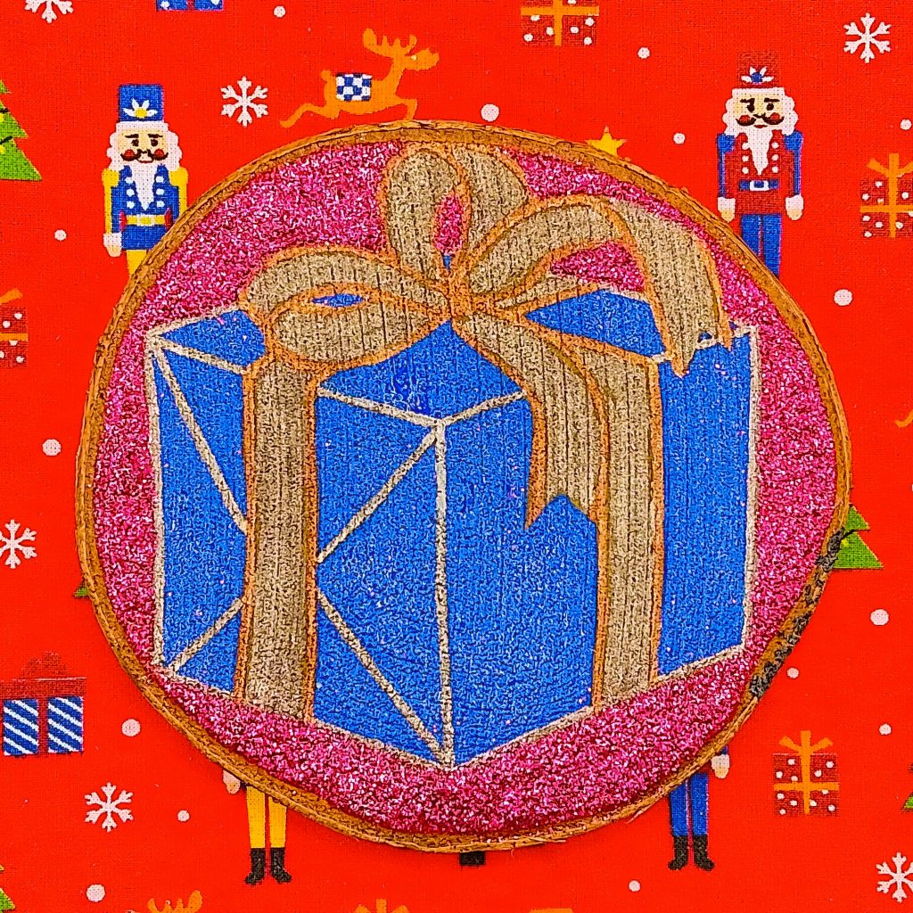 Rondin paquet cadeau de Noël pailleté